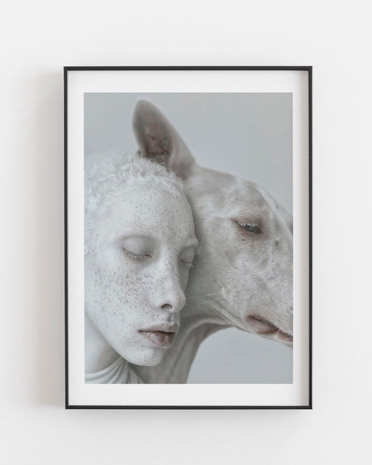 Fine art print featuring an ethereal portrait of an albino human and an albino animal in soft pale tones, printed on Hahnemühle Photo Rag paper for a high-quality matte finish, celebrating unique beauty and connection.